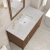 Includes Eternal Jasmine Pearl quartz vanity top and rectangular sink (may not be pictured on main image)

Included Components:

Covered under James Martin Vanities' 1 year limited warranty
Ash, poplar and walnut vanity cabinet with 1 door, 6 drawers and 1 shelf
Silestone quartz vanity top with 1 rectangular porcelain sink
Cabinet Features:

Constructed with a solid wood frame and plywood panels
One 120-volt UL rated electric outlet with USB ports and bamboo organizer included
Includes one soft-close door that opens to an interior shelf and three full-extension drawers that feature soft-close undermount glides
Toggle style door pulls
The drawer boxes feature English dovetail joinery, and an brushed aluminum laminate drawer liners for easy cleaning
Includes one removable bamboo drawer organizer
Cabinets are sealed with a premium finish for superior moisture and UV resistance
Vanity Top Features:

Vanity set includes a 3cm eased edge Eternal Jasmine Pearl quartz Silestone quartz top
Includes a white porcelain rectangular undermount sink that ships separately and mounting brackets for easy installation
Top is pre-drilled for 8" widespread faucet
Faucet not included
Quartz vanity tops are curated from a 95 percent blend of ground natural quartz with 5 percent polymer resin to create an ultra-durable and low maintenance surface
Quartz requires no sealing and resists staining and corrosion from liquids, including most household cleaning products
Center drain location provides optimal draining capability
Equipped with an overflow to help prevent water overflow and spillage from occurring
Cabinet Specifications:

Cabinet Width: 48" (from left to right)
Cabinet Height: 34-1/16" (from top to bottom)
Cabinet Depth: 23-1/2" (from front to back)
Number of Doors: 1
Number of Drawers: 6
Number of Shelves: 1
Vanity Top Specifications:

Vanity Top Width: 48" (left edge to right edge)
Vanity Top Depth: 23-1/2" (front edge to back edge)
Vanity Top Thickness: 3 cm (1-3/16")
Number of Basins: 1
Number of Faucet Holes: 3
Faucet Centers: 8" (distance between the installation holes for the faucet handles)